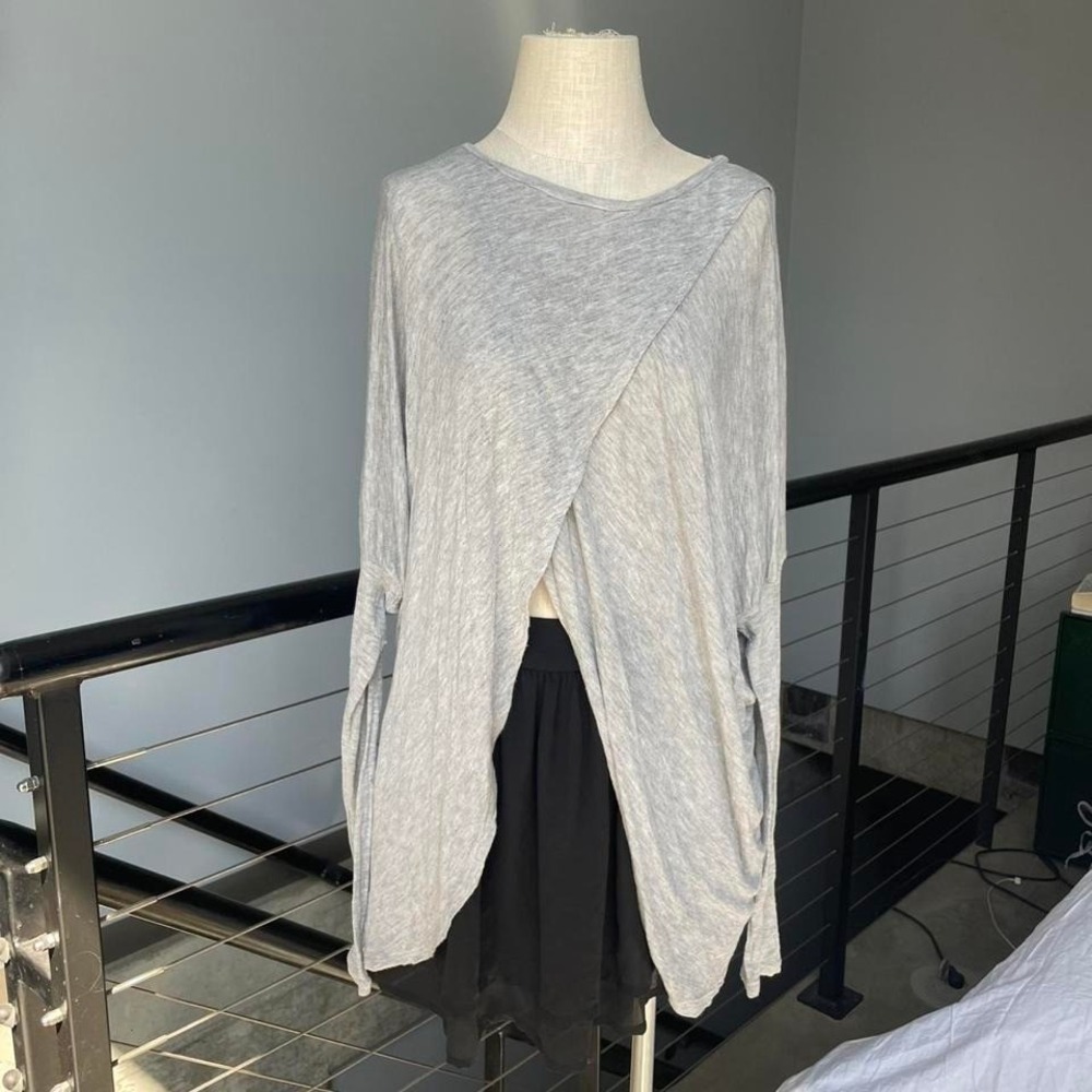 Very unique light grey long sleeve perfect for layering size medium